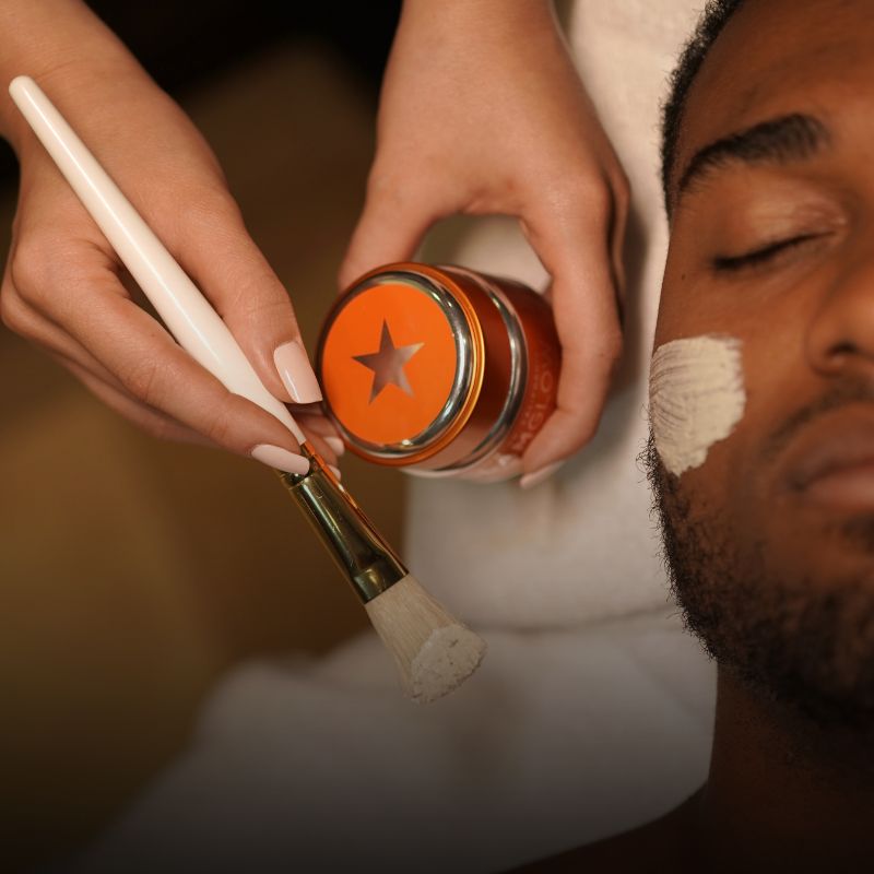 A man receives a men's skin care facial at Jazz Lounge Spa.